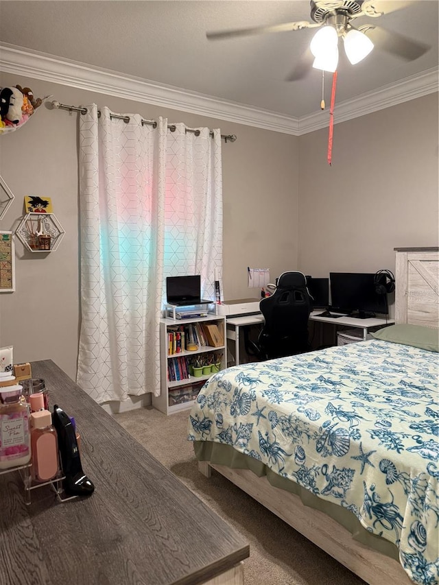 bedroom featuring crown molding, a ceiling fan, and carpet flooring