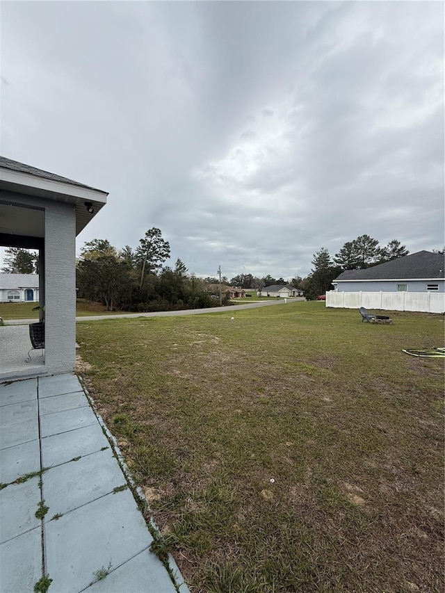 view of yard with fence