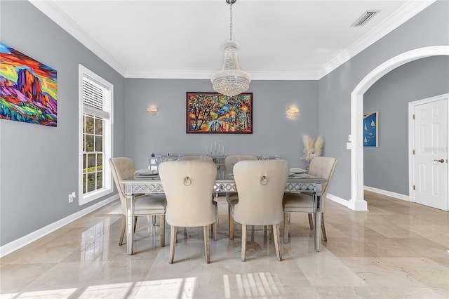 dining space with visible vents, arched walkways, baseboards, ornamental molding, and marble finish floor