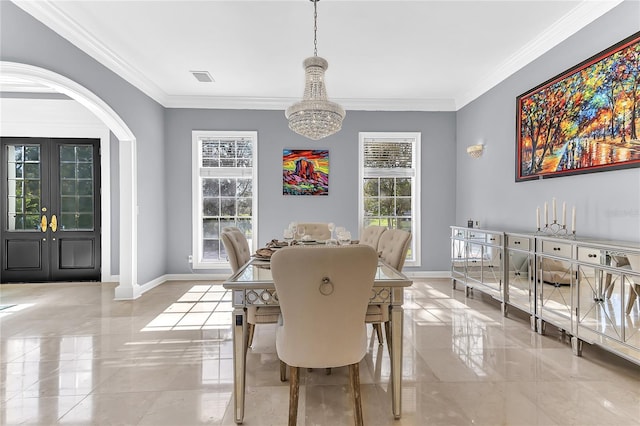 dining area with a chandelier, marble finish floor, ornamental molding, and baseboards