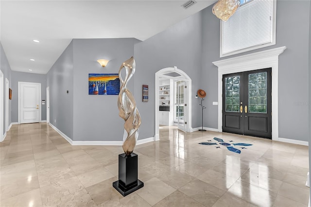 entryway featuring french doors, visible vents, and baseboards