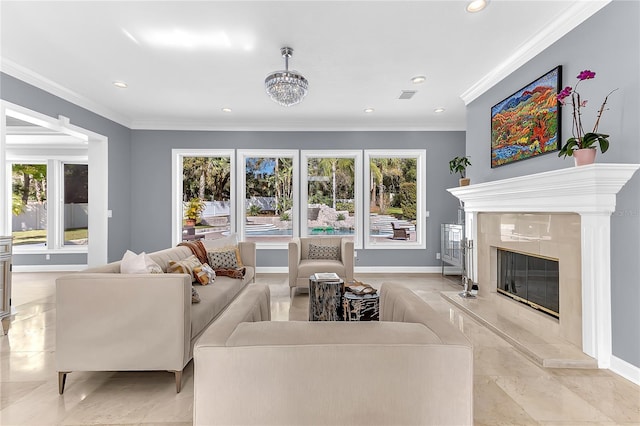 living area featuring baseboards, ornamental molding, a wealth of natural light, and a high end fireplace