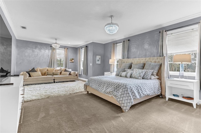 bedroom with carpet flooring, crown molding, visible vents, and a notable chandelier