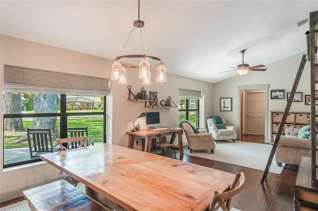 dining area with lofted ceiling, ceiling fan, baseboards, and hardwood / wood-style floors