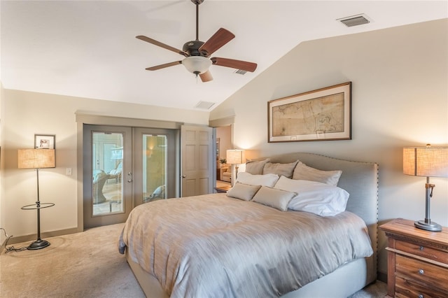 carpeted bedroom with vaulted ceiling, access to outside, french doors, and visible vents