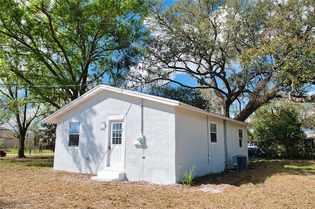 view of outbuilding with cooling unit