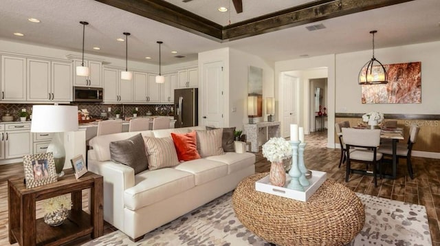 living room with baseboards, visible vents, a ceiling fan, wood finished floors, and recessed lighting