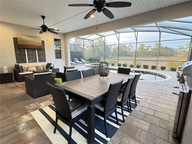 view of patio / terrace with an outdoor pool, ceiling fan, a lanai, outdoor lounge area, and outdoor dining space