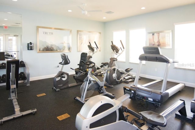 gym featuring a healthy amount of sunlight, baseboards, french doors, and recessed lighting