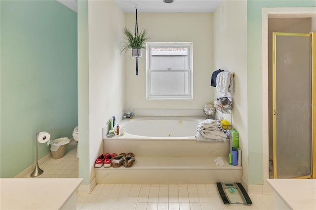 full bathroom with vanity, toilet, a stall shower, and a whirlpool tub