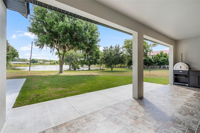 view of patio / terrace with a water view