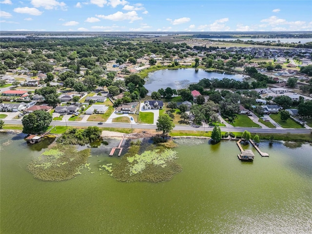 aerial view featuring a water view and a residential view