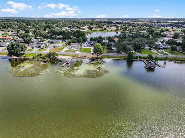 aerial view with a residential view and a water view