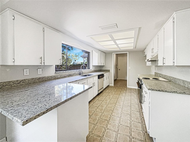 kitchen featuring dishwashing machine, under cabinet range hood, a peninsula, a sink, and white cabinets