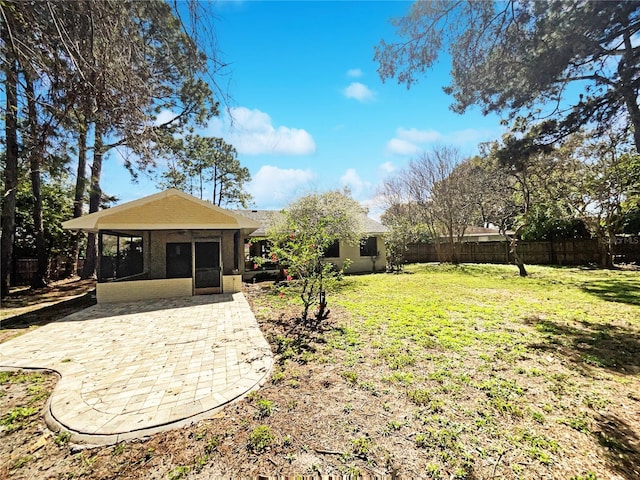 view of yard with a patio area and fence