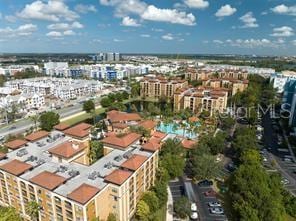 birds eye view of property featuring a city view