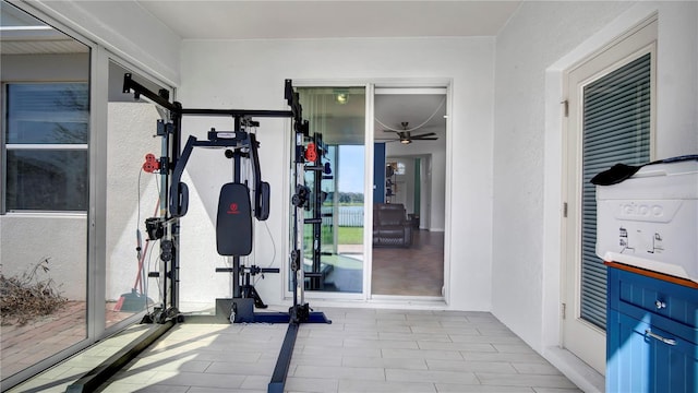 exercise area with a ceiling fan