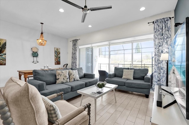 living area featuring recessed lighting, light wood-style floors, and ceiling fan