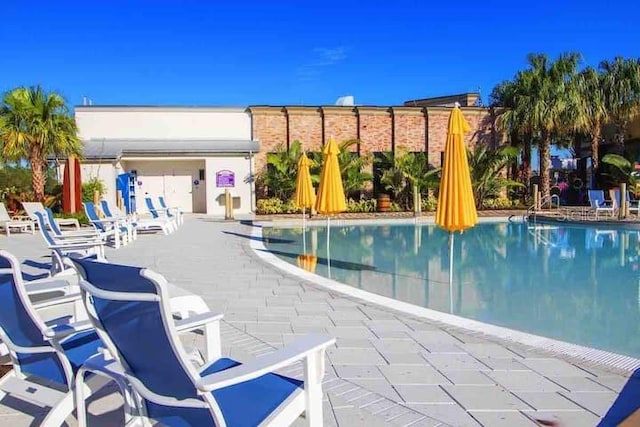 pool with a patio