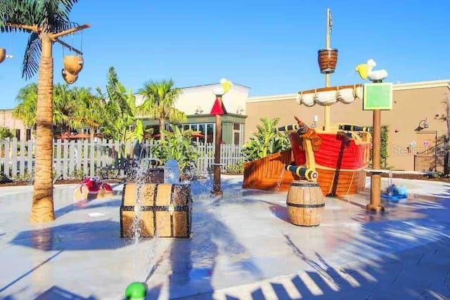 view of playground with fence