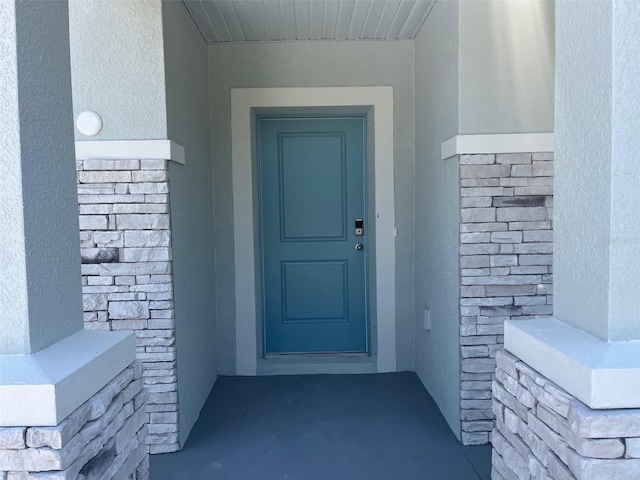 2005 Canton Park Dr, Winter Haven, FL 33881 - entrance to property with stucco siding and stone siding
