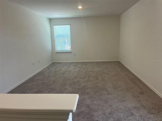 2005 Canton Park Dr, Winter Haven, FL 33881 - carpeted spare room featuring baseboards