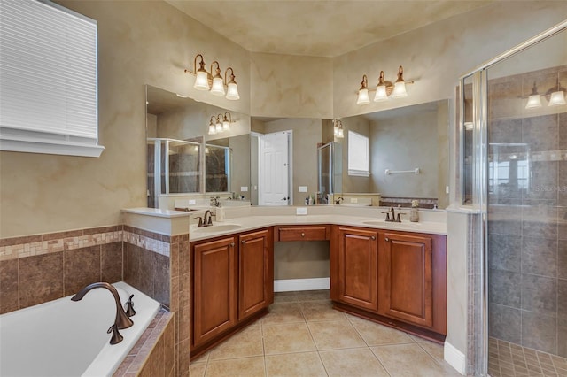 bathroom featuring double vanity, a stall shower, a sink, tile patterned flooring, and a bath