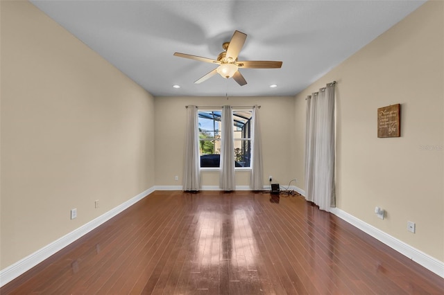 empty room featuring recessed lighting, ceiling fan, baseboards, and hardwood / wood-style flooring