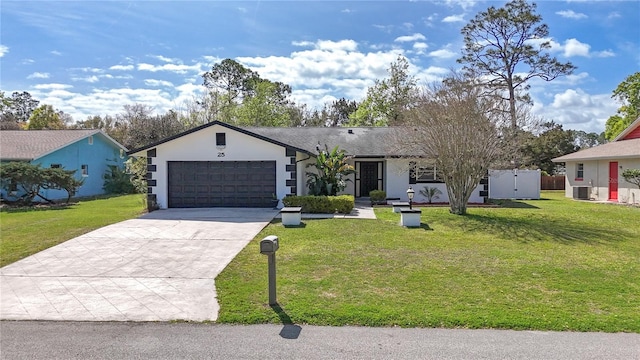 single story home featuring stucco siding, central AC unit, a garage, driveway, and a front lawn