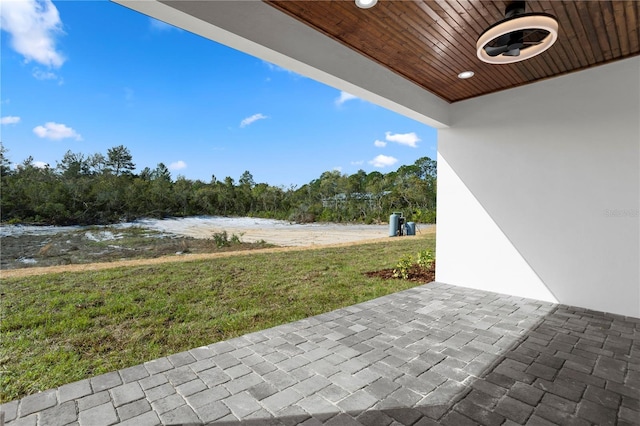 view of patio / terrace featuring a water view