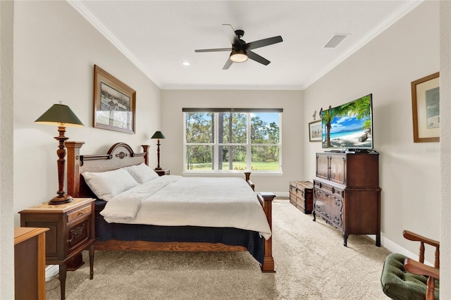 bedroom with light carpet, ornamental molding, visible vents, and baseboards