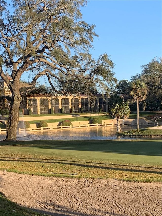 view of home's community featuring a yard