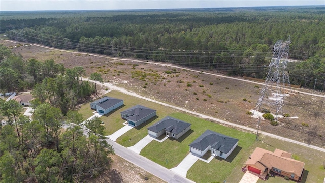 aerial view featuring a forest view