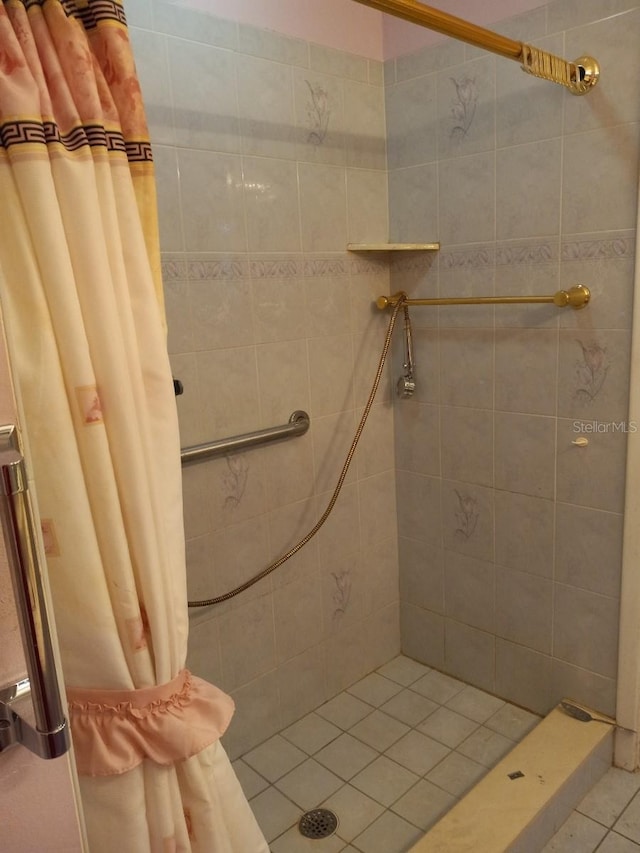 bathroom with a stall shower