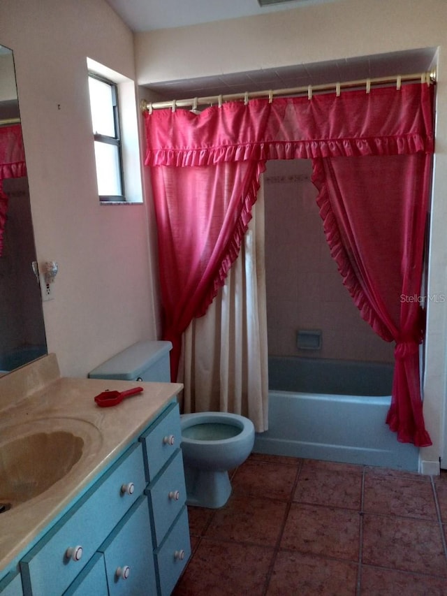 full bathroom with toilet, tile patterned floors, shower / bath combo with shower curtain, and vanity