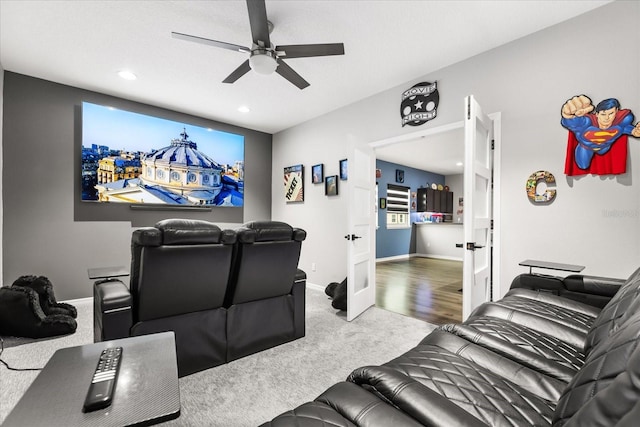 carpeted home theater room featuring recessed lighting, french doors, ceiling fan, and baseboards