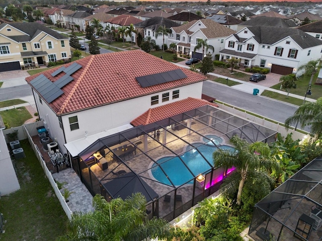 exterior space with a patio, a fenced backyard, a residential view, and a fenced in pool