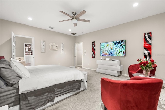 carpeted bedroom featuring baseboards, visible vents, ceiling fan, and recessed lighting