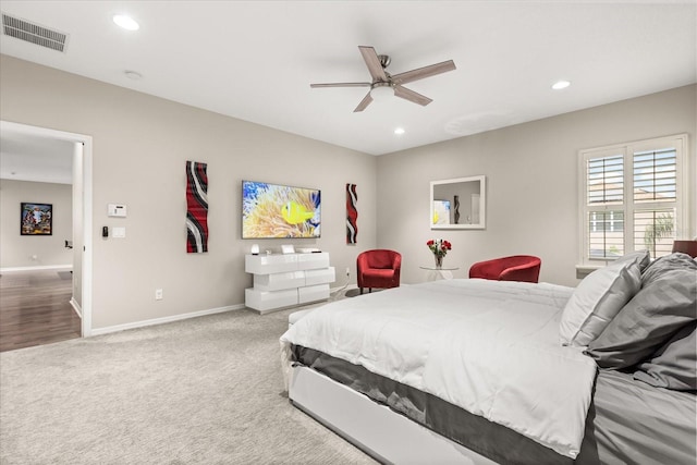 carpeted bedroom with baseboards, visible vents, a ceiling fan, and recessed lighting