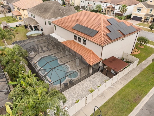 birds eye view of property with a residential view