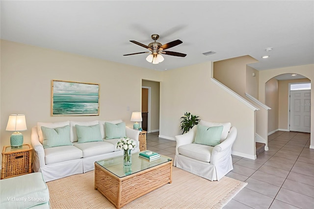 39 Hickory Course Way, Ocala, FL 34472 - living area with arched walkways, ceiling fan, light tile patterned flooring, baseboards, and recessed lighting