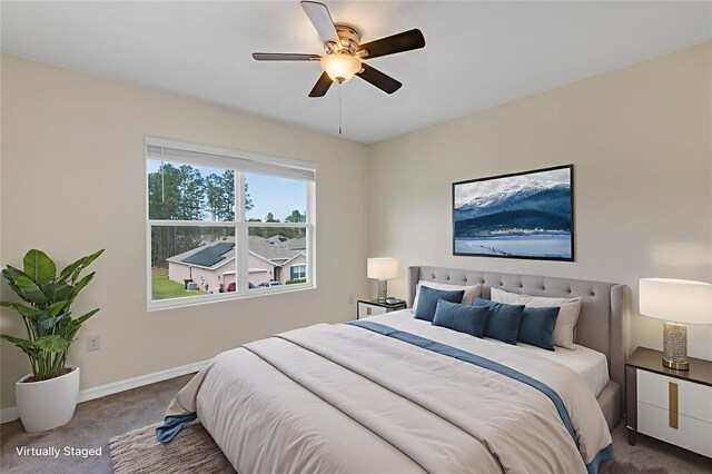 39 Hickory Course Way, Ocala, FL 34472 - bedroom with carpet floors, baseboards, and a ceiling fan