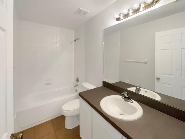 bathroom with visible vents, toilet, washtub / shower combination, vanity, and tile patterned flooring