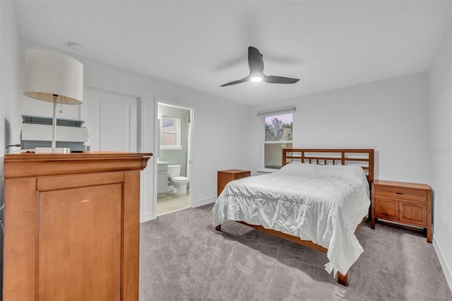 bedroom featuring carpet flooring and baseboards