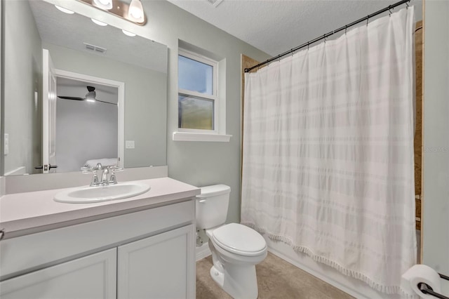 bathroom with a textured ceiling, toilet, visible vents, vanity, and shower / tub combo with curtain