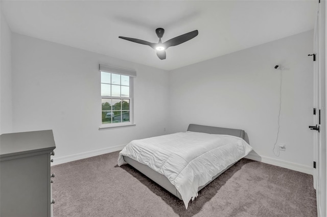 bedroom featuring carpet flooring, ceiling fan, and baseboards