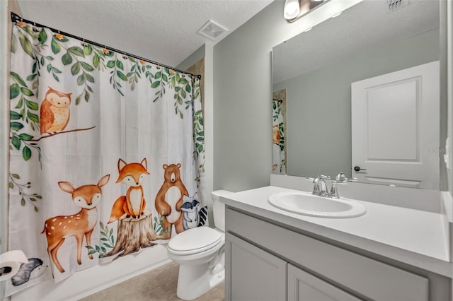 bathroom featuring a textured ceiling, tile patterned flooring, toilet, vanity, and visible vents