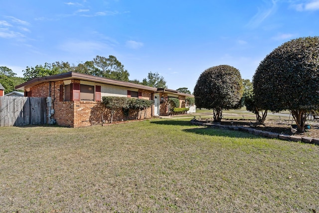 view of yard featuring fence