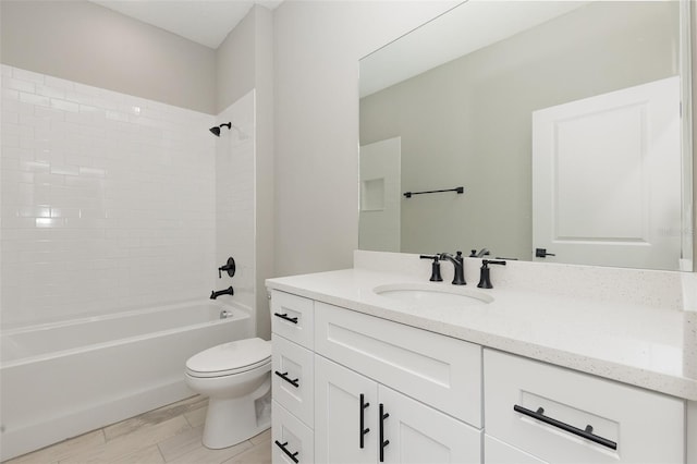 full bath featuring shower / bath combination, vanity, and toilet