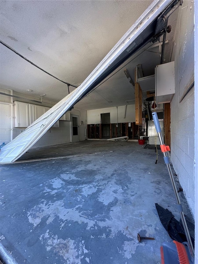 interior space featuring concrete block wall